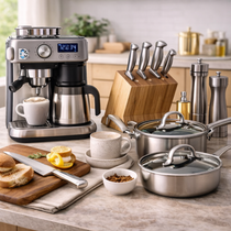 Kitchen setup with coffee machine, knives, pots, and a breakfast scene on a wooden countertop.