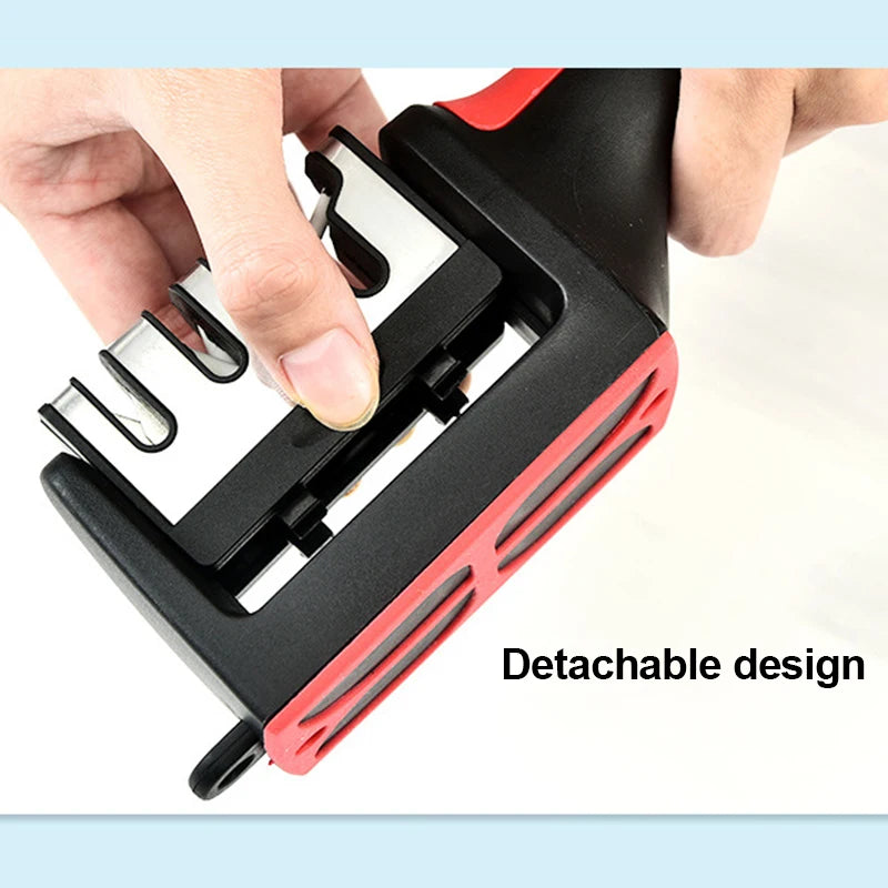 Hand holding a black and red tool with detachable design feature