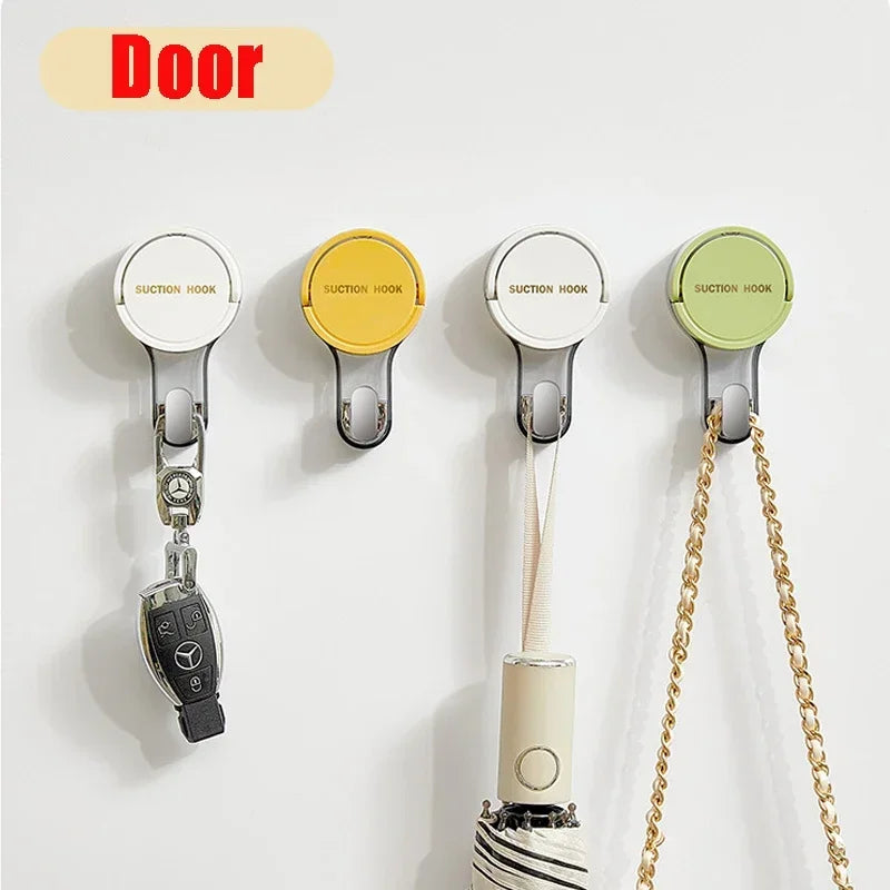 Four suction hooks in different colors on a white background with 'Door' text above.