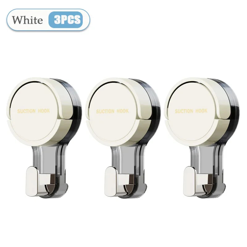 Three white wall hooks with silver brackets on a white background